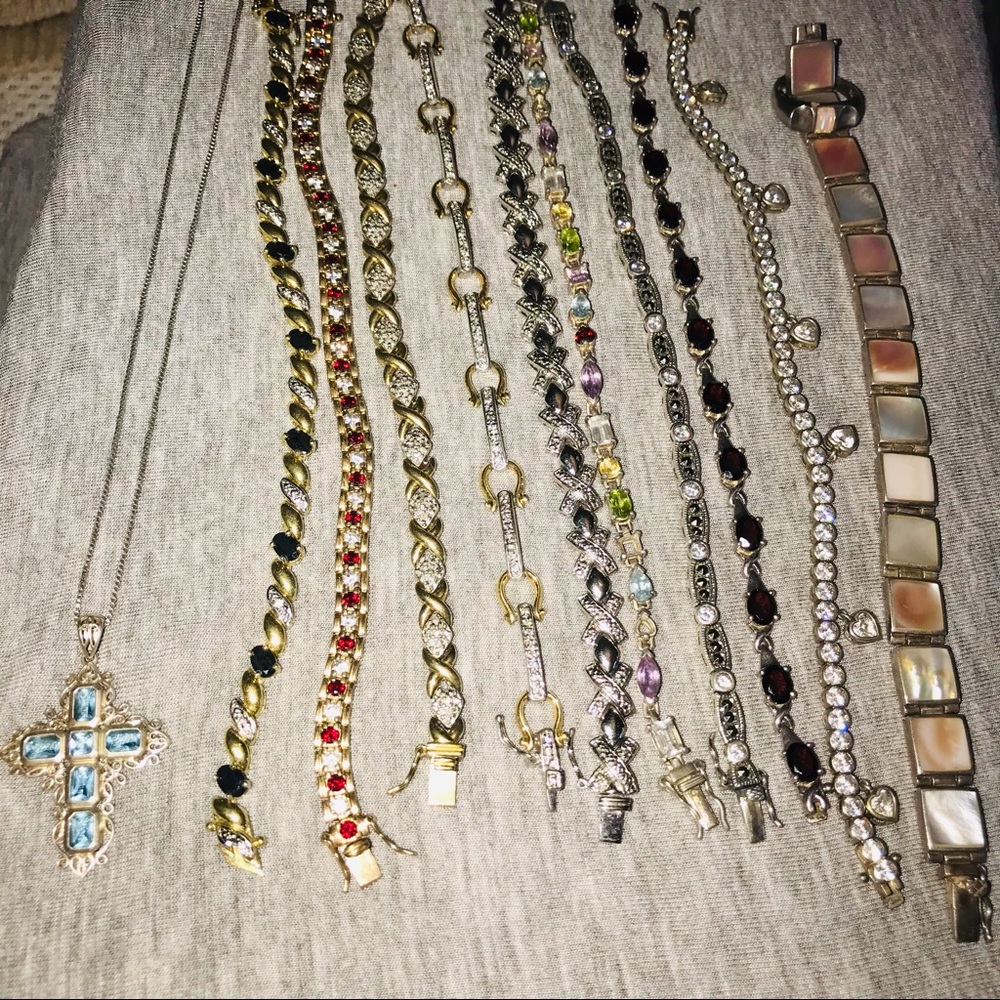 10 bracelets, 1 necklace, 1 matching ring